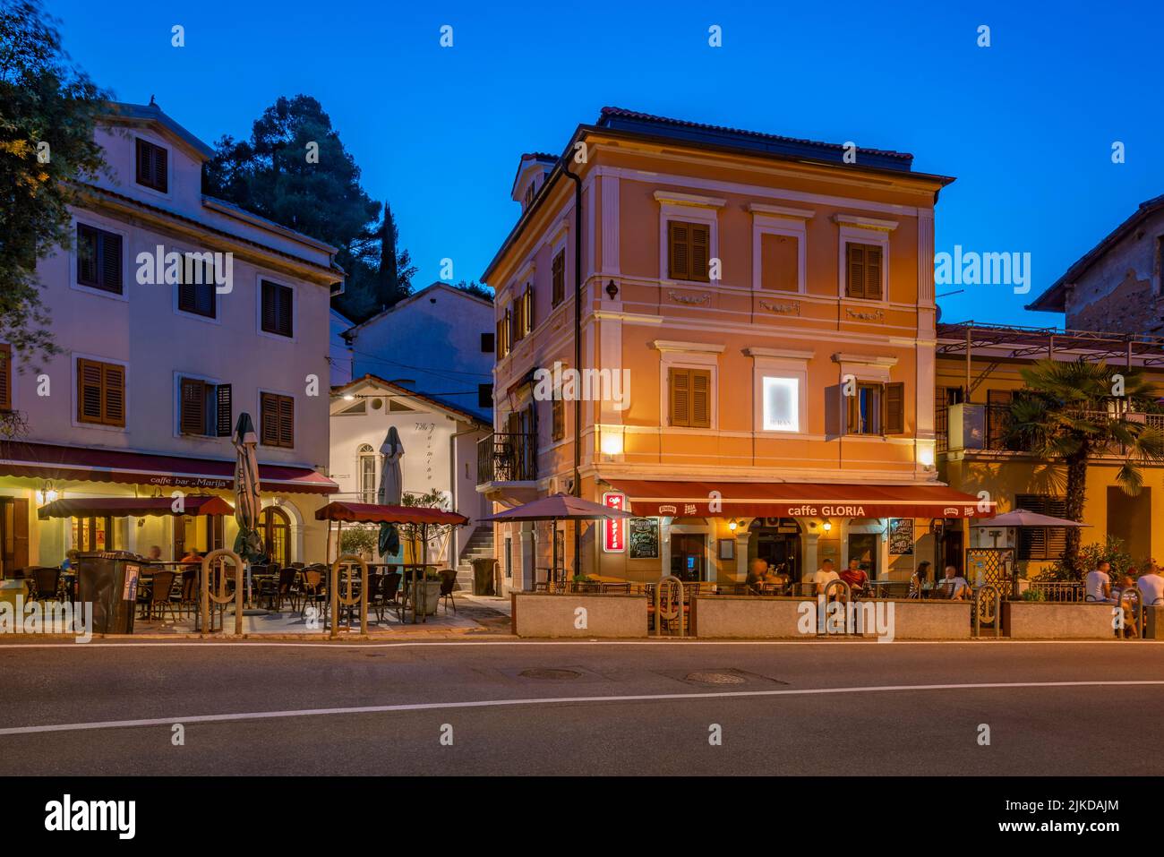 View of bar and restaurant at Ika at dusk, Ika, Kvarner Bay, Eastern Istria, Croatia, Europe Stock Photo