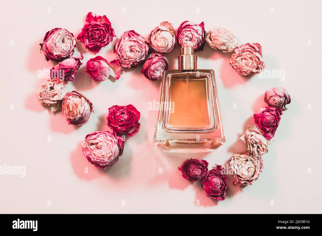 female perfume gift flower arrangement dried roses Stock Photo