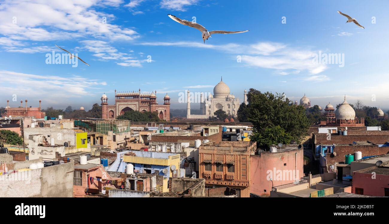 Agra poor buildings in front of Taj Mahal, India. Stock Photo