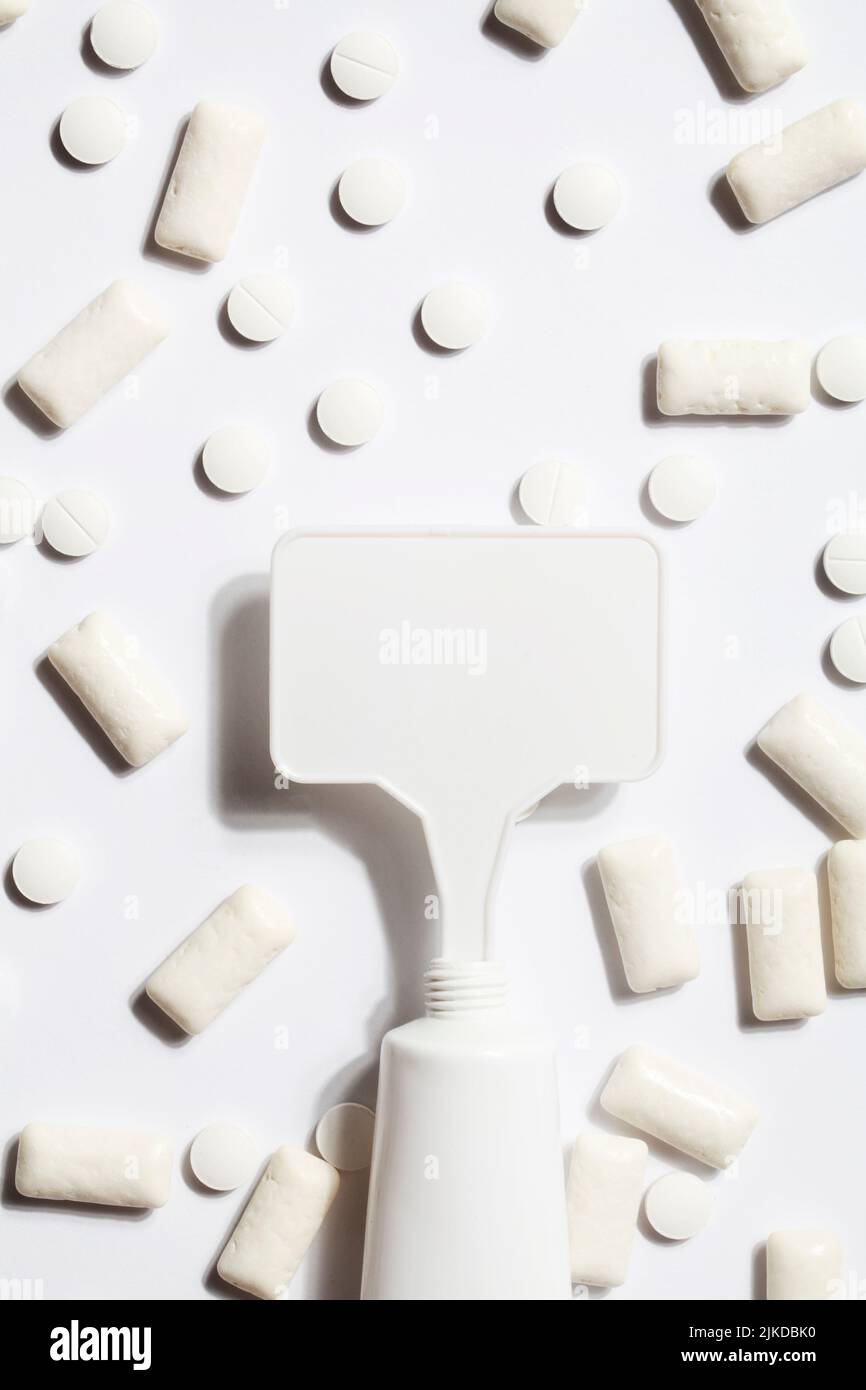 Titanium dioxide, E171, dangerous additive concept. gum, pills