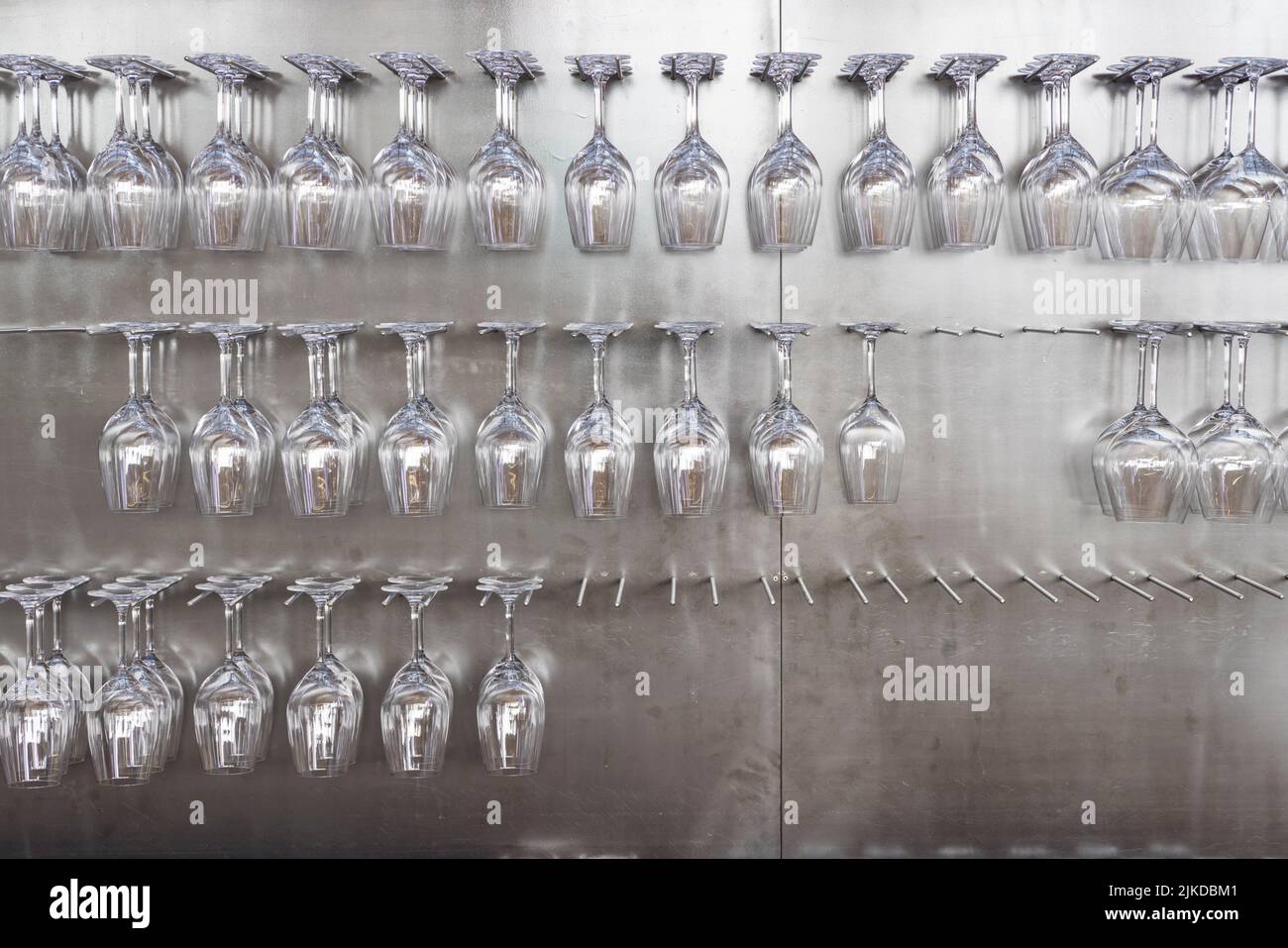 Wine glasses hanging on wall in wine shop Stock Photo Alamy