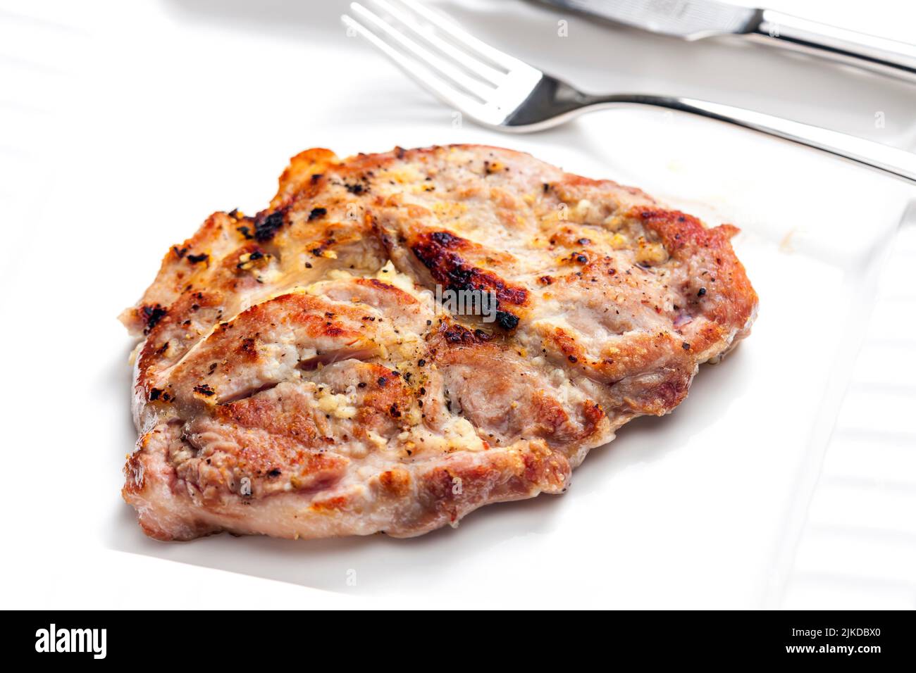 pork cutlet on white plate. Stock Photo