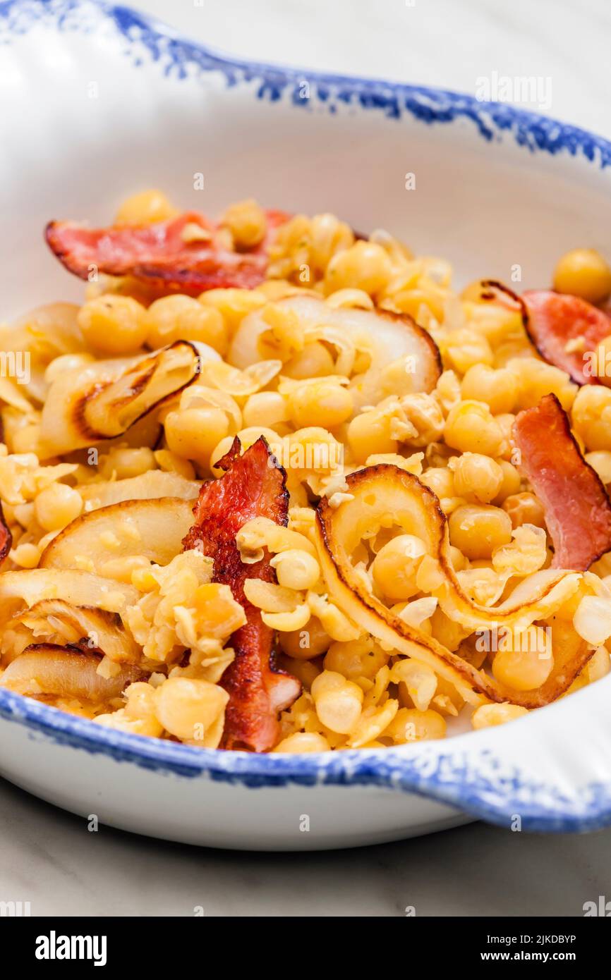yellow peas with bacon and onion. Stock Photo