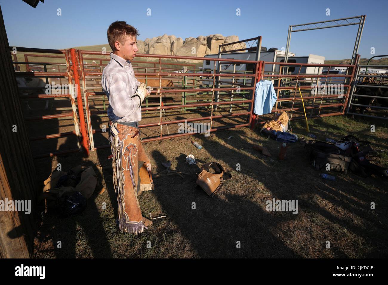 Gage Hillis, of Stoughton, Sask., after he competes in junior bull riding during the first rodeo held since the coronavirus disease (COVID-19) pandemic in the World Heritage Site location of Writing-On-Stone Provincial Park, Alberta, Canada, July 31, 2022.  REUTERS/Leah Hennel Stock Photo
