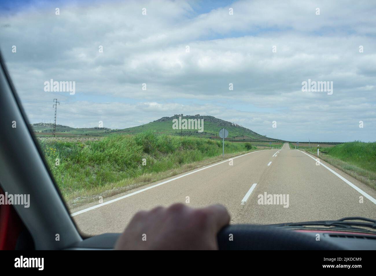 Approaching to Magacela town from EX-348 road. View from the inside of the car. Stock Photo