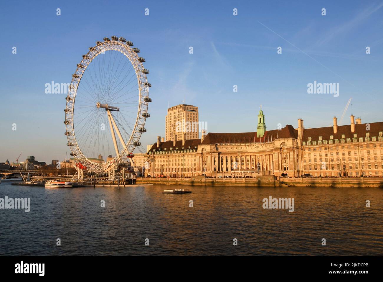 London, England - Aril 1, 2012: The London Eye, or the Millennium Wheel, is a cantilevered observation wheel (ferris wheel) on the South Bank of the Stock Photo