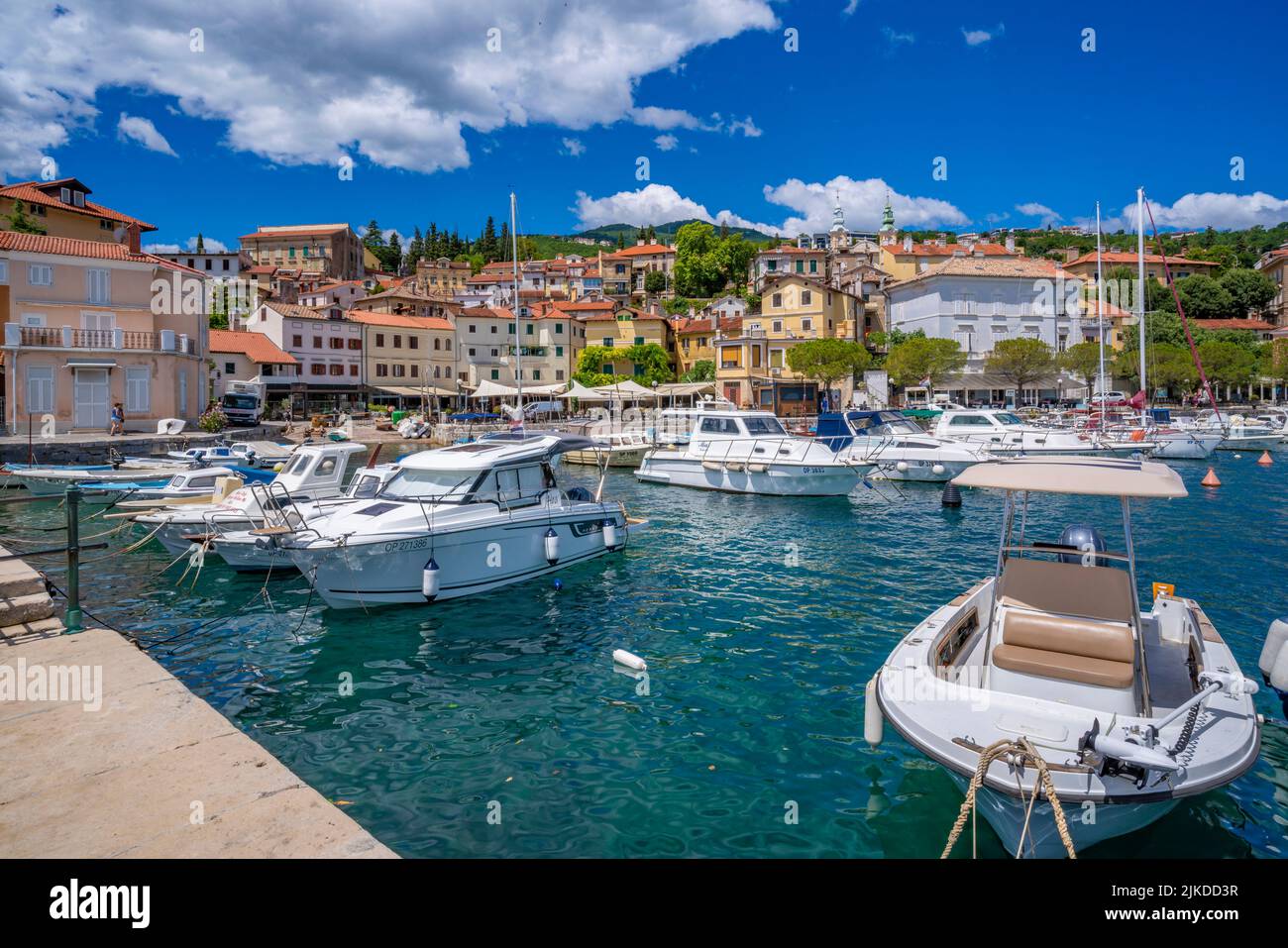 View of hotels and church overlooking marina at Volosko, Eastern Istria, Kvarner Bay, Eastern Istria, Croatia, Europe Stock Photo