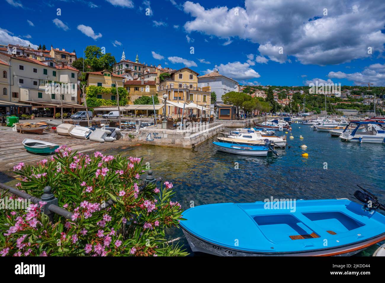 View of hotels and church overlooking marina at Volosko, Eastern Istria, Kvarner Bay, Eastern Istria, Croatia, Europe Stock Photo