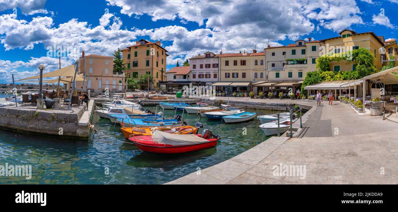 View of restaurants and cafes overlooking marina at Volosko, Eastern Istria, Kvarner Bay, Eastern Istria, Croatia, Europe Stock Photo
