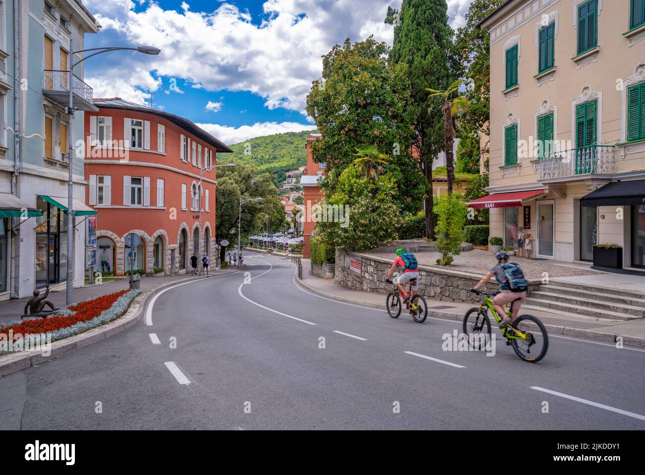 View of cyclists on main street in Opatija, Eastern Istria, Kvarner Bay, Eastern Istria, Croatia, Europe Stock Photo