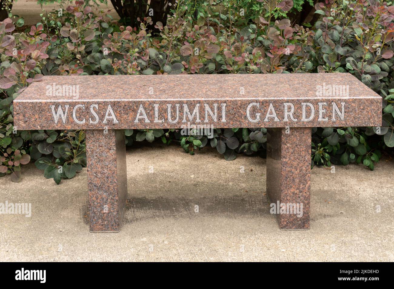 MORRIS, MN, USA - JULY 9, 2022: West Central School of Agriculture Alumini Garden bench on the campus of the University of Minnesota Morris. Stock Photo