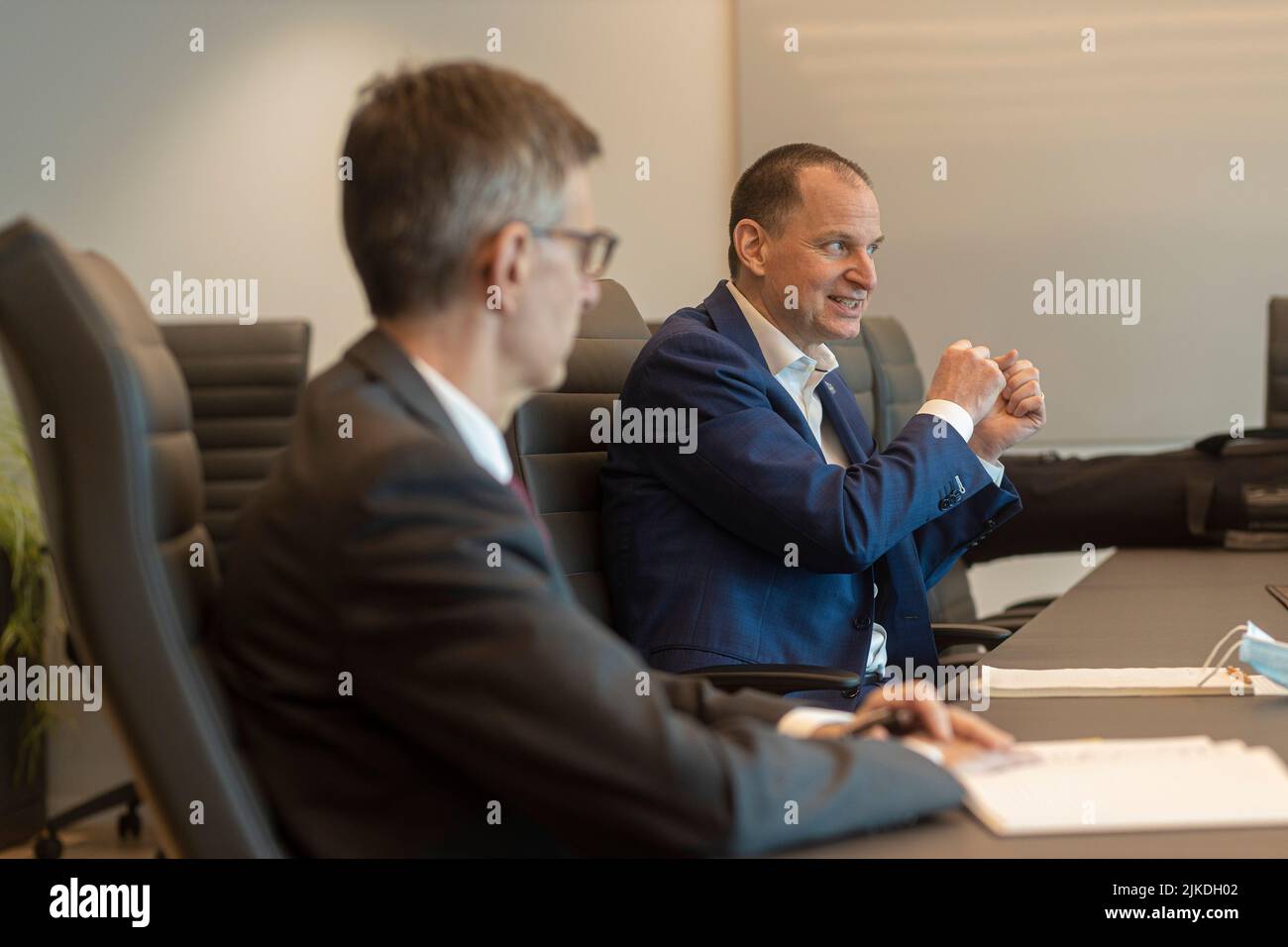 Quebec finance Minister Eric Girard (right) and his deputy minister Pierre Cote answer questions at his Quebec City office Thursday March 17, 2022. Stock Photo