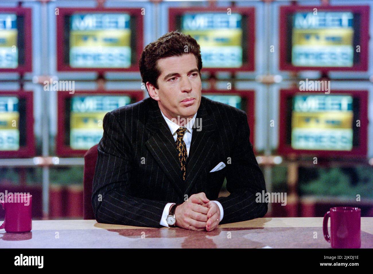 John F. Kennedy Jr, son of the late US president, discusses his political journal 'George' during NBC's Meet the Press interview program, February 16, 1997 in Washington, DC. Stock Photo
