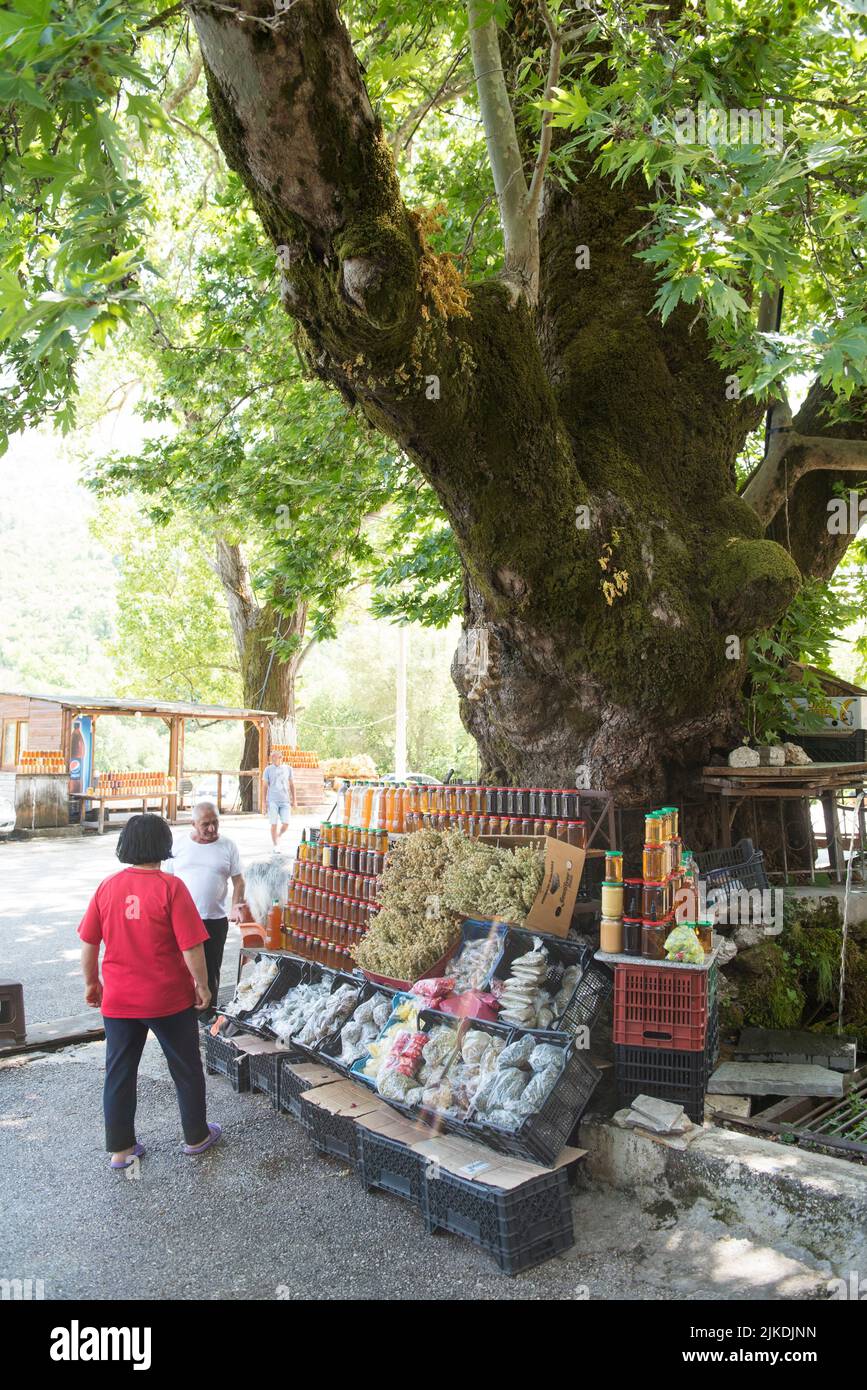 Roadside stop selling local products, between Saranda and Gjirokaster, Albania, Southeastern Europe. Stock Photo
