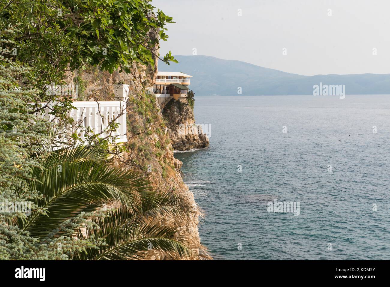 Liro Hotel backed by the cliff, Vlore, seaside resort on the Adriatic Sea, Albania, Southeastern Europe. Stock Photo