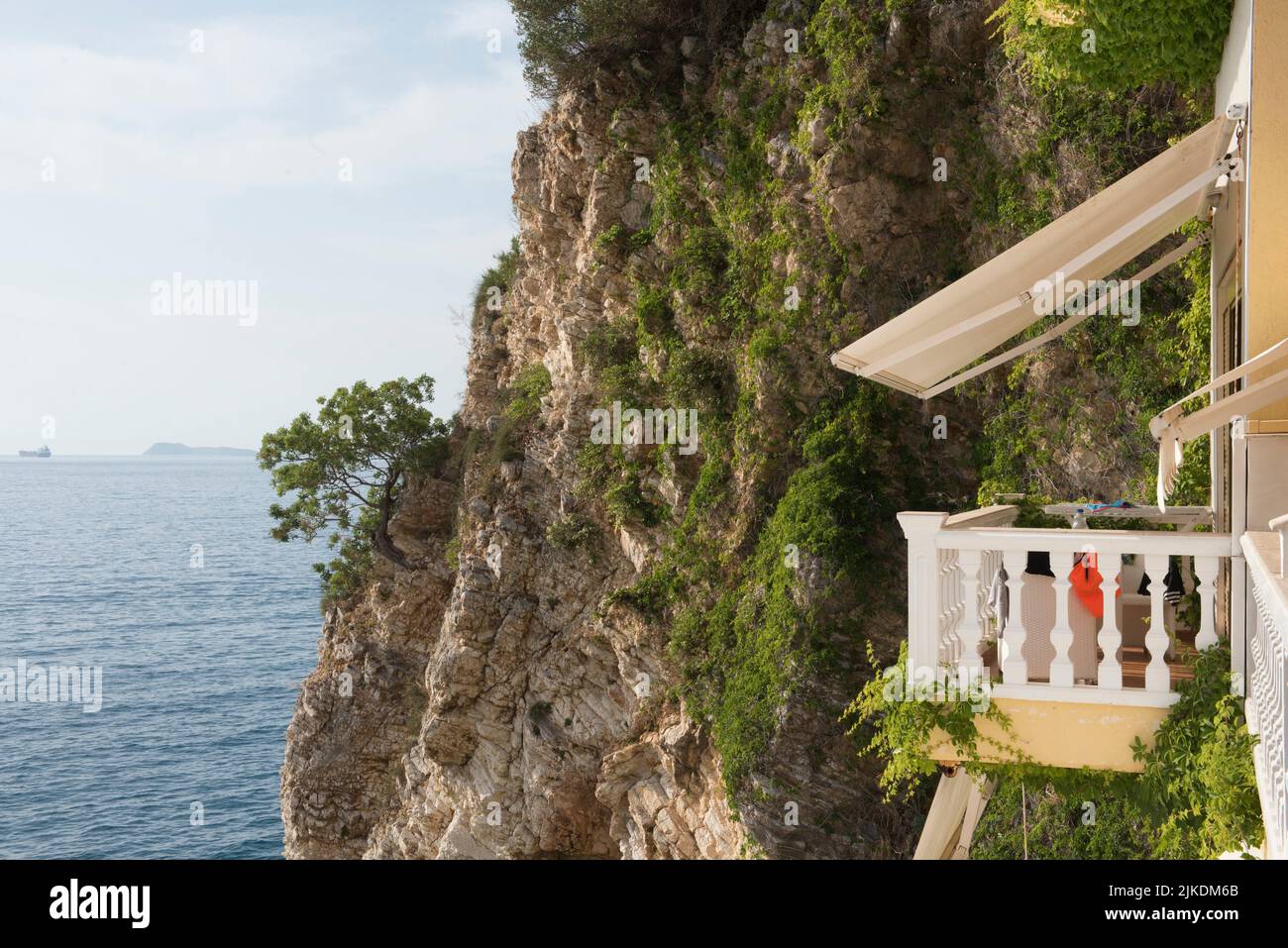Liro Hotel backed by the cliff, Vlore, seaside resort on the Adriatic Sea, Albania, Southeastern Europe. Stock Photo