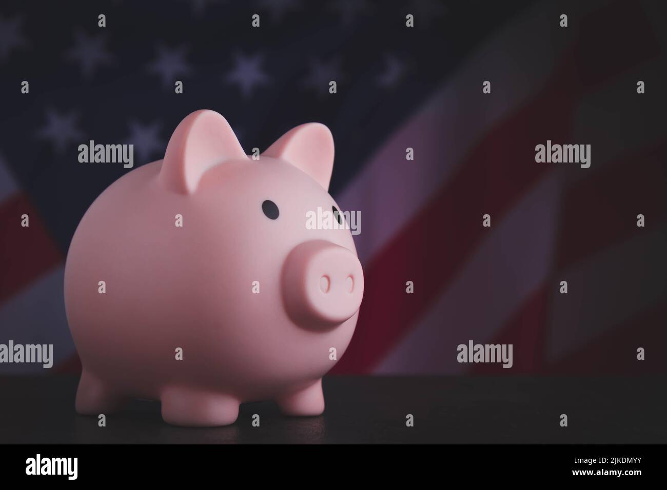 Accumulation of money in the USA. Piggy bank and flag of america. debt and credit. investment in the country. Stock Photo