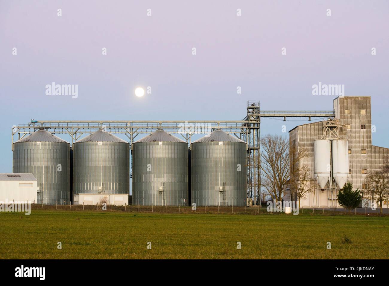 Steel grains bins in the moonlight, Municipality of Coulombs, Eureet