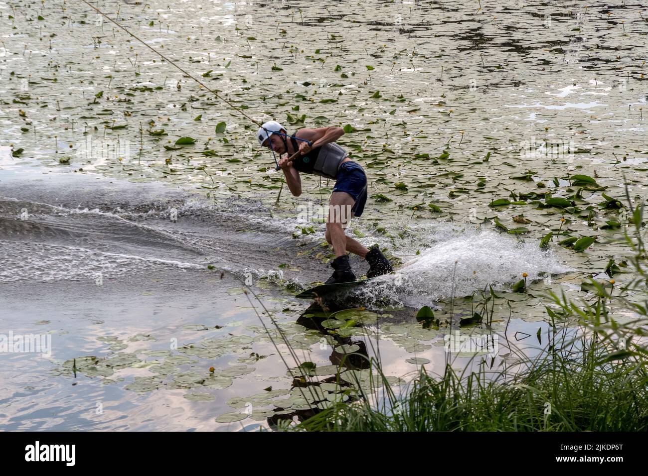 Yaroslavl, Russia. 23rd  July, 2022: A man is engaged in wakeboarding on the Volga River in the city of Yaroslavl, Russia Stock Photo