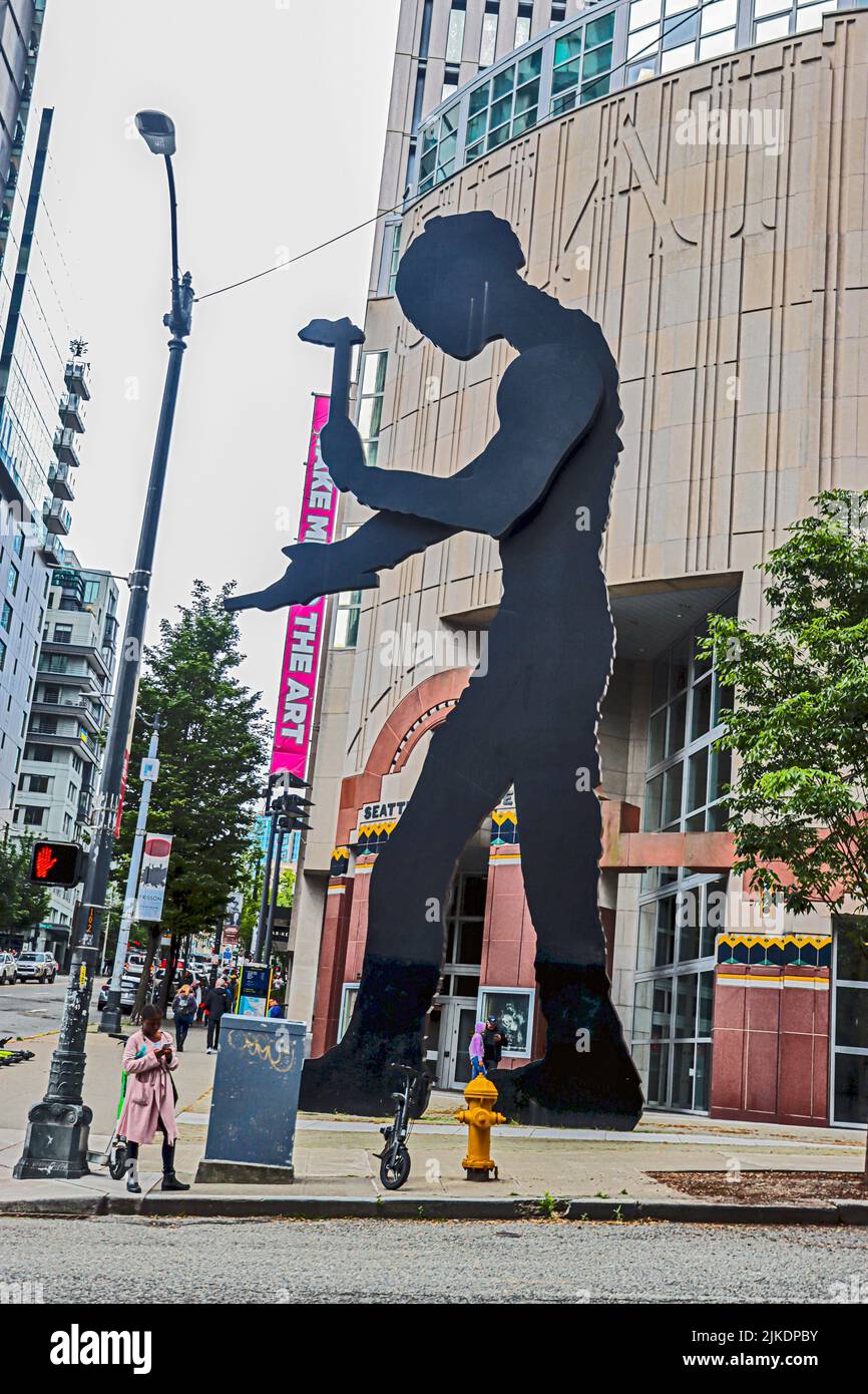Hammering Man by Jonathan Borofsky In front of the Seattle Art Museum (SAM). Hammering Man is 48 feet tall. Stock Photo