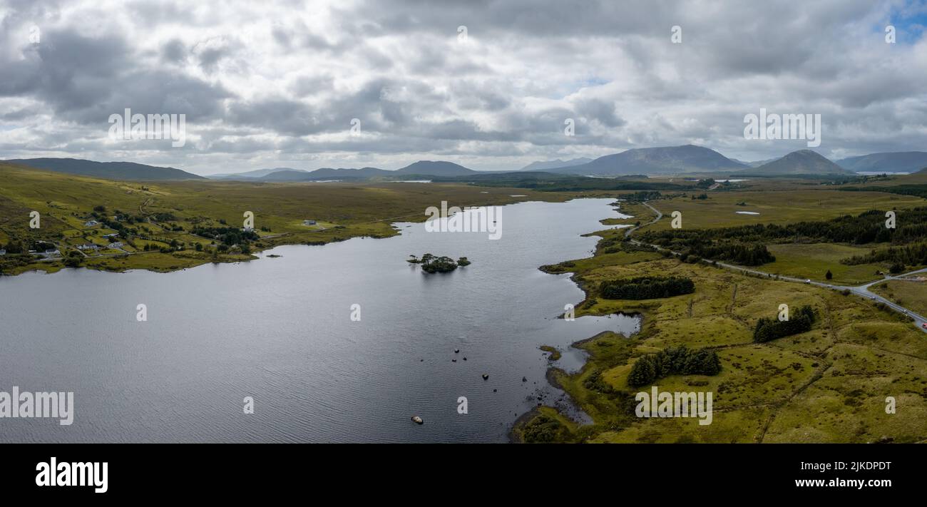 A panorama landscape view of Lough Bofin lake near Maam Cross in County Galway of western Ireland Stock Photo