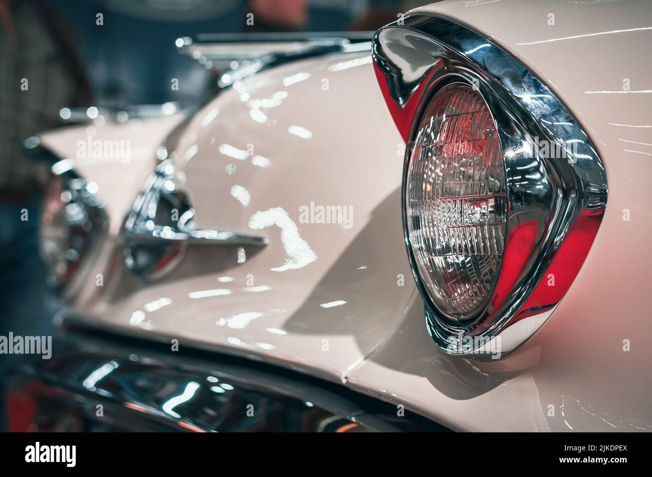 Classic car headlights closeup. The concept of a poster on the wall