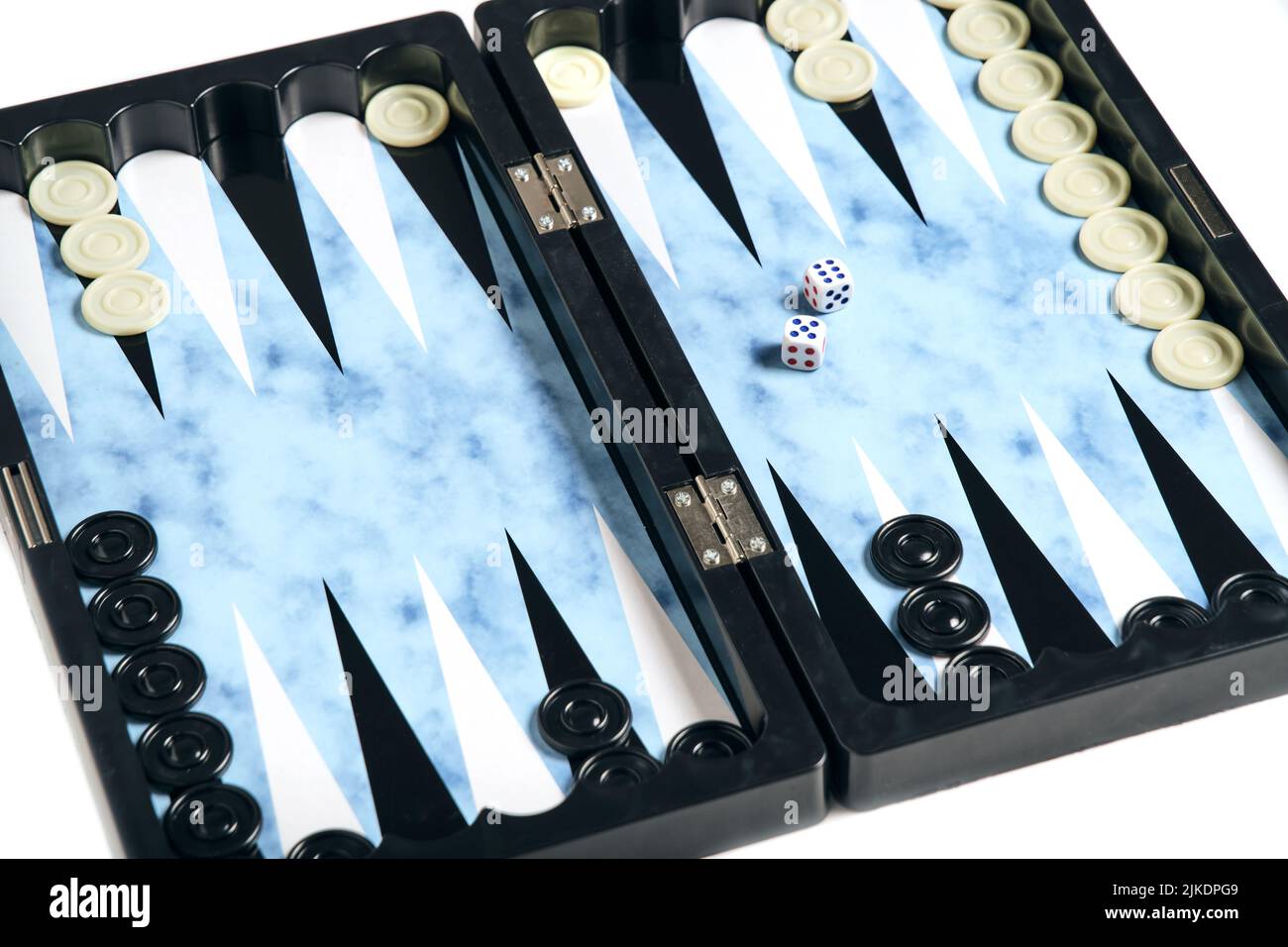 Board with cubes and chips for playing backgammon Stock Photo