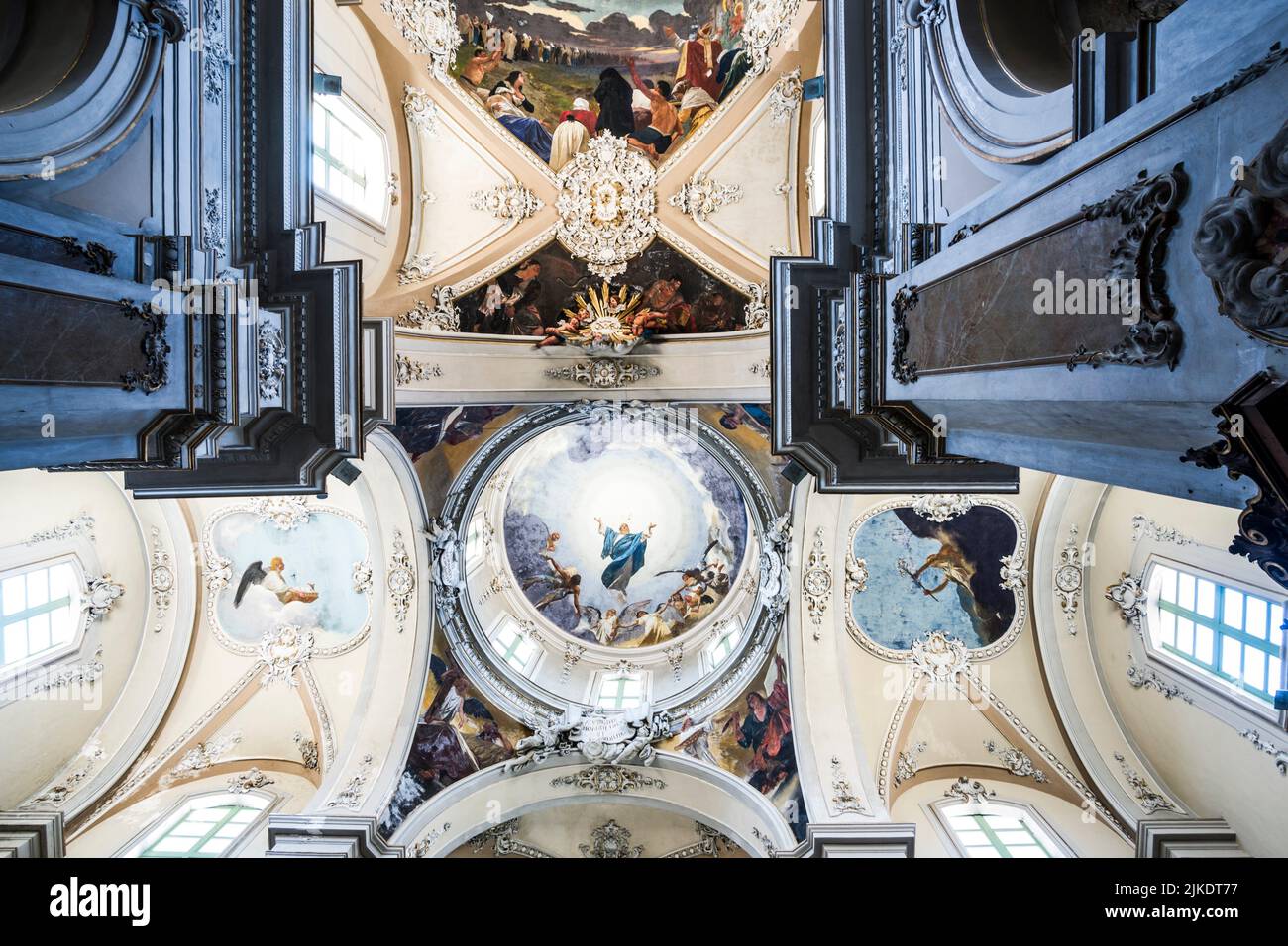 Low-angle view of ceiling. Interior of Basilica della Collegiata (Ancient Royal and Eminent Basilica Collegiate of Our Lady of the Alms). Via Etnea, Stock Photo
