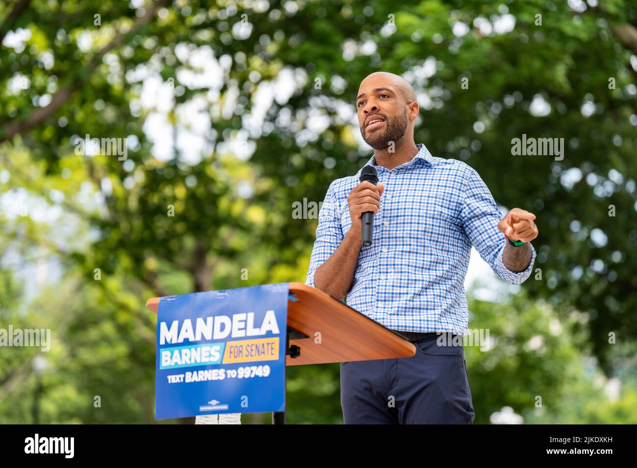 Mandela Barnes, a Democratic candidate for US Senator in Wisconsin, speaks to a crowd during an outdoor campaign event in the summer of 2022. Stock Photo