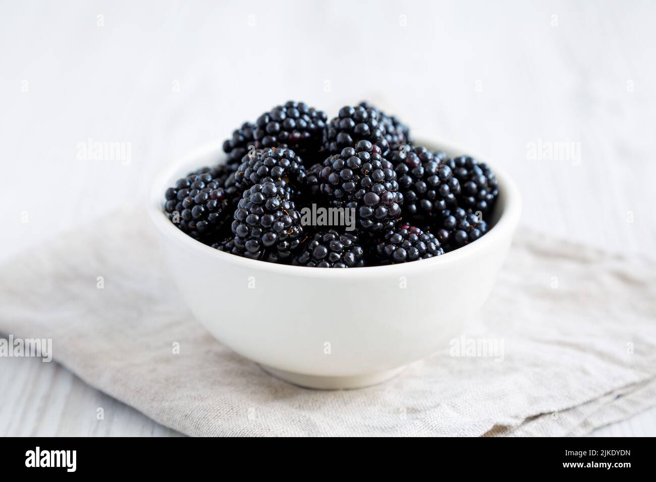 Raw Blackberries in a Bowl, side view. Stock Photo