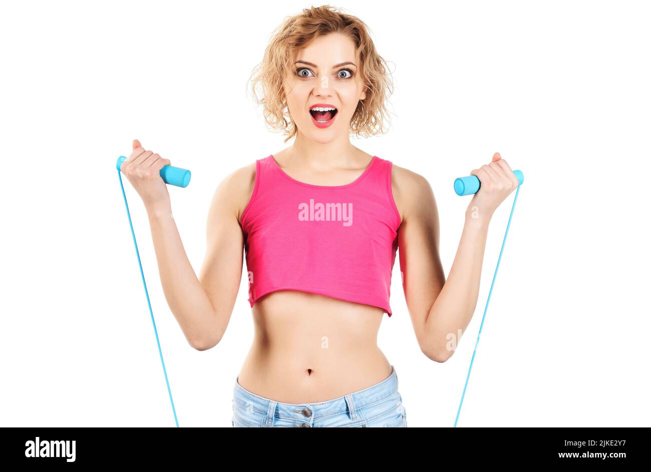 Woman in sportswear with skipping rope. Excited fitness instructor with jump rope. Sport lifestyle. Stock Photo