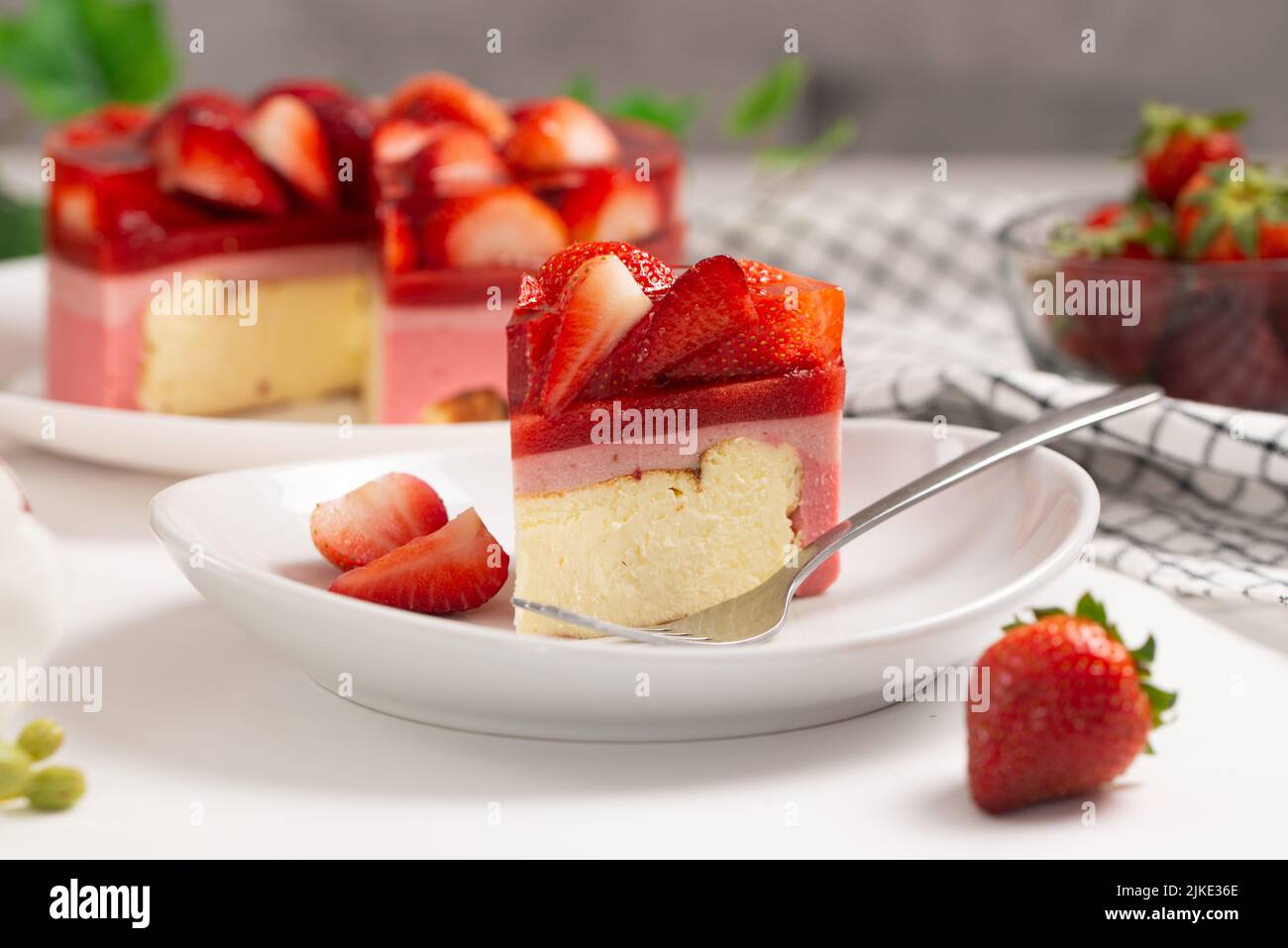 Strawberry cheesecake with jelly and fresh strawberries Stock Photo