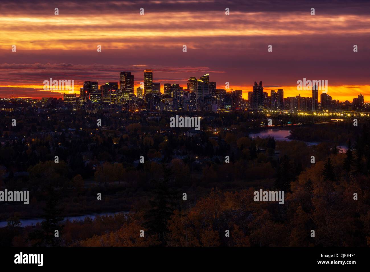 View of Calgarys beautiful skyline along the Bow River at sunrise Stock ...