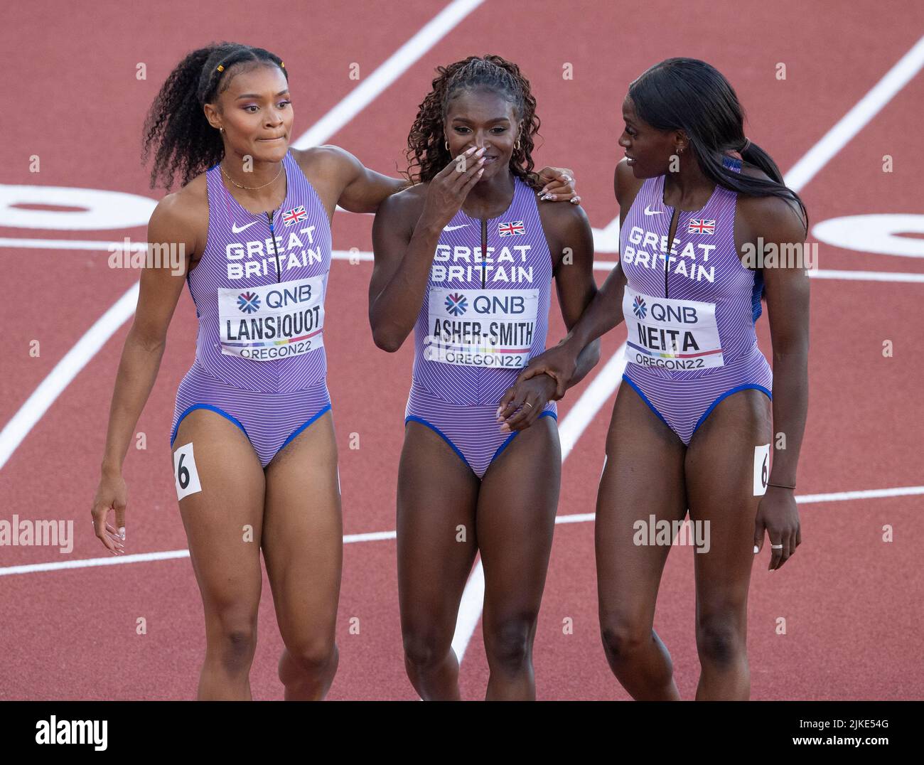 Imani Lansiquot and Daryll Neita (GB&NI) giving Dina Asher-Smith a hug ...