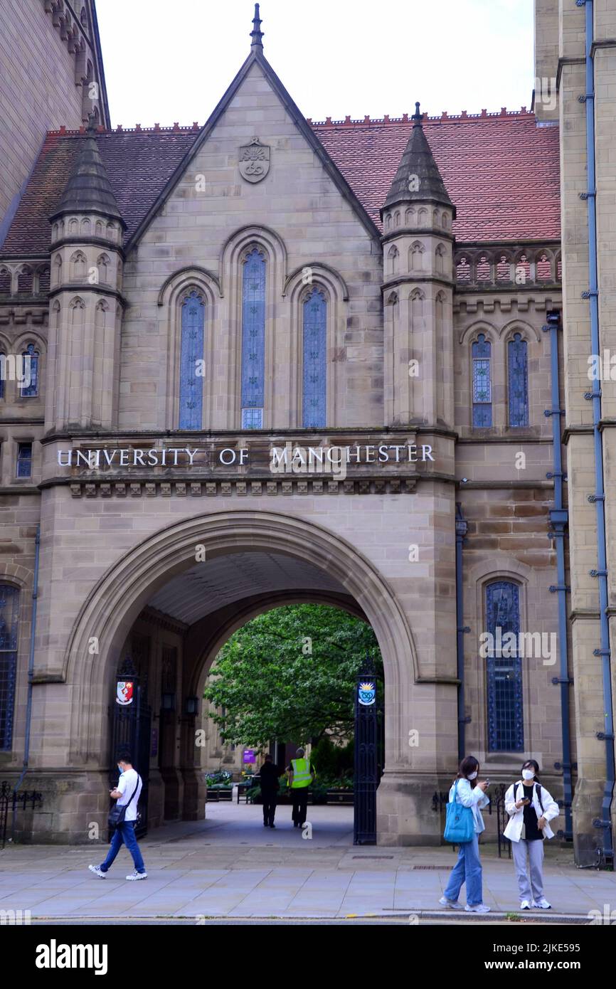 People walk in front of Whitworth Hall, University of Manchester, Oxford Road, Manchester, England, United Kingdom, British Isles. The UK Government has stopped the University of Manchester from licensing vision sensing technology to a Chinese company, citing national security grounds. The UK Government believes there is “potential” for this technology to be used for military purposes and can use the National Security and Investment Act 2021 to halt the agreement. The University of Manchester had made an agreement with Beijing Infinite Vision Technology Company Ltd. Stock Photo