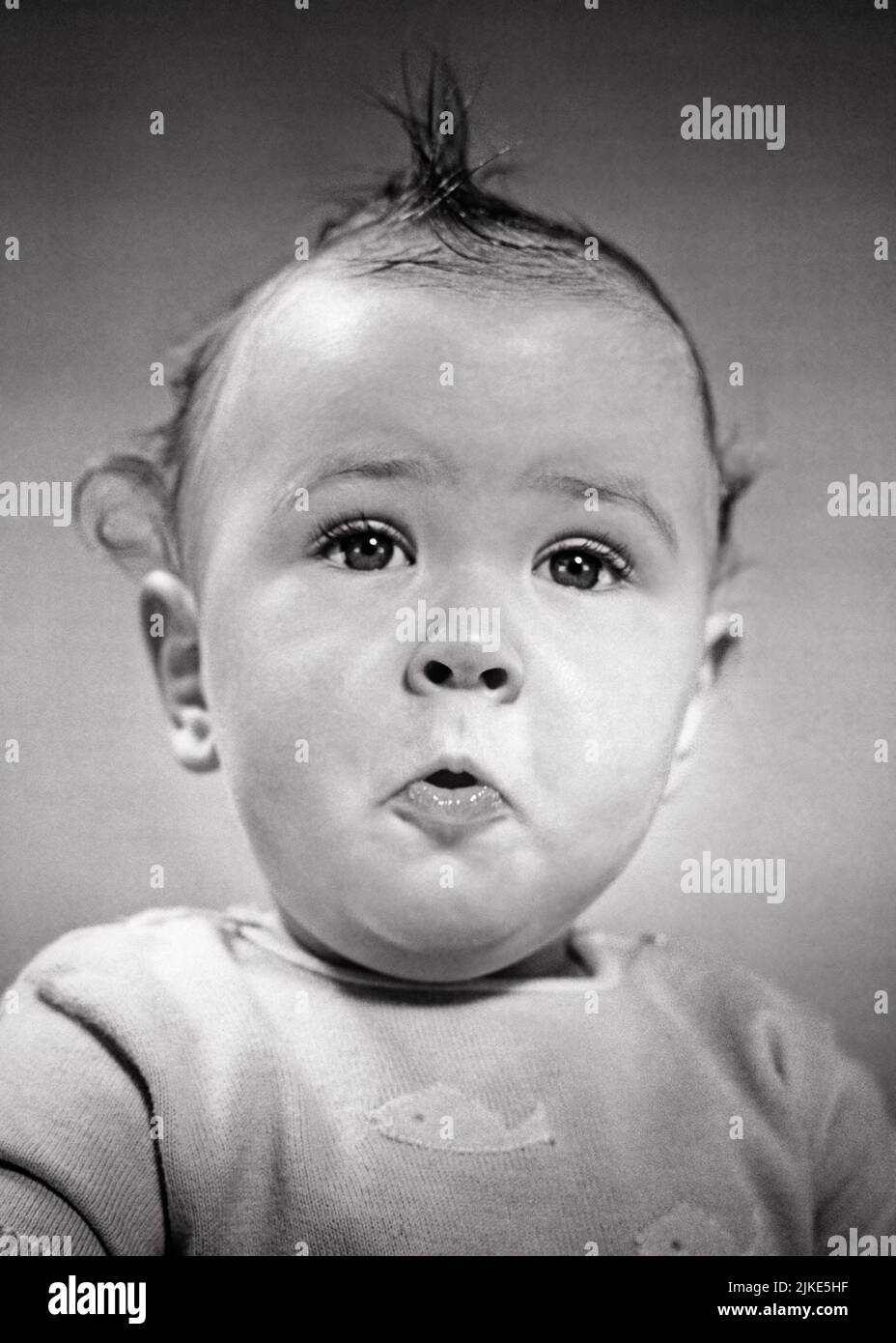 1940s SURPRISED BABY BOY WITH FUNNY FACIAL EXPRESSION LOOKING AT CAMERA WITH TEAR FILLED EYES - b2268 HAR001 HARS SHOCKED COMIC INFANT WORRY LIFESTYLE STUDIO SHOT MOODY HOME LIFE COPY SPACE CRY MALES EXPRESSIONS TROUBLED AMAZED B&W CONCERNED SADNESS EYE CONTACT BRUNETTE WONDER AWE HUMOROUS HEAD AND SHOULDERS ATTENTION EXCITEMENT COMICAL MOOD TEAR CONCEPTUAL GLUM AMAZE COMEDY STARTLE BABY BOY SOURPUSS STUN ASTONISHED DUMBFOUND FILLED JUVENILES MISERABLE STARTLED BLACK AND WHITE CAUCASIAN ETHNICITY HAR001 OLD FASHIONED Stock Photo