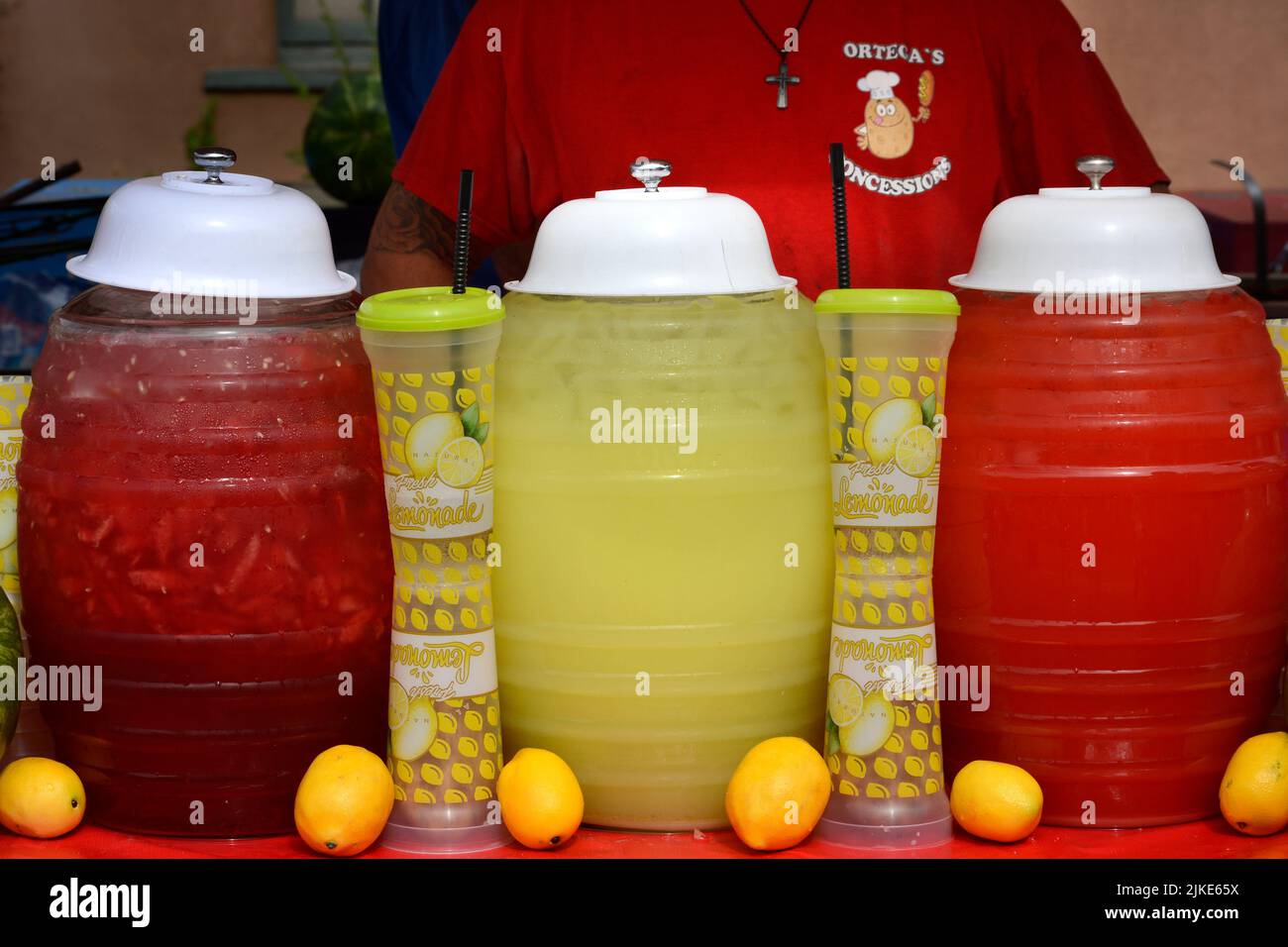 https://c8.alamy.com/comp/2JKE65X/a-food-vendor-sells-lemonade-and-watermelon-juice-beverages-at-an-outdoor-festival-in-santa-fe-new-mexico-2JKE65X.jpg