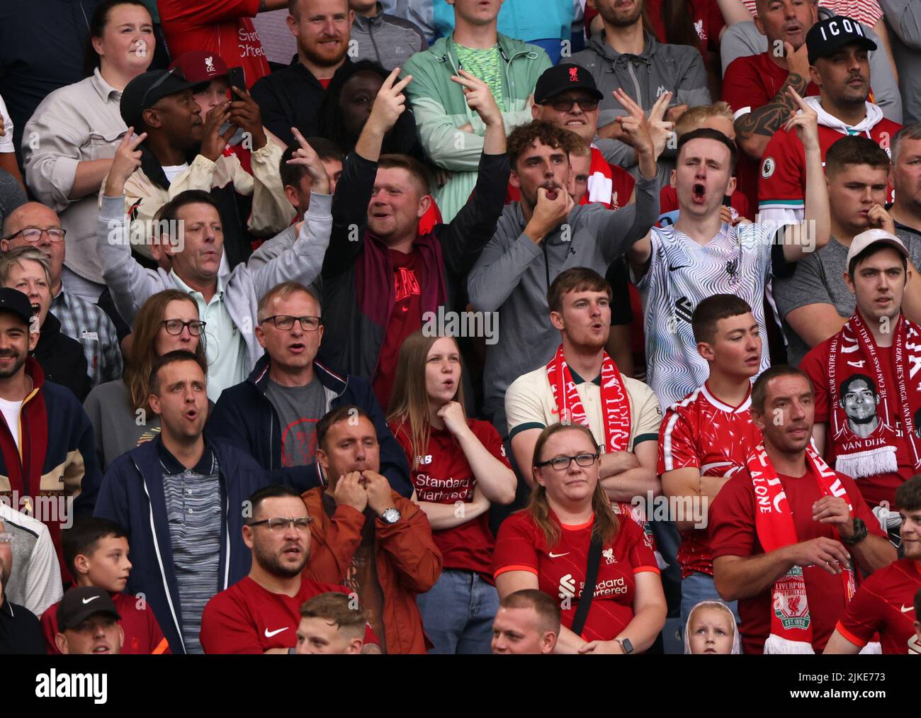 Leicester, UK. 30th July, 2022. Some Liverpool fans boo and stick fingers up during the singing of The National Anthem at the FA Community Shield match Liverpool v Manchester City, at King Power Stadium, Leicester, UK, on July 30, 2022 Credit: Paul Marriott/Alamy Live News Stock Photo