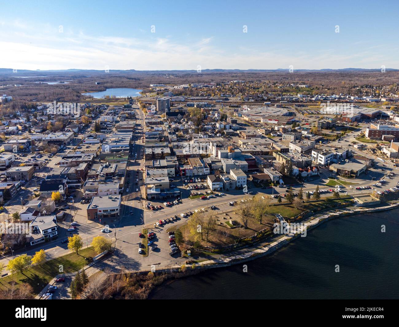 Aerial view of Rouyn-Noranda City and Osisko Lake in a fall season sunny day. Abitibi-Temiscamingue, Quebec, Canada. Stock Photo