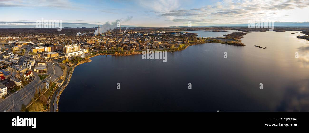 Aerial panoramic view of Rouyn-Noranda City and Osisko Lake on sunset time. Abitibi-Temiscamingue, Quebec, Canada. Stock Photo