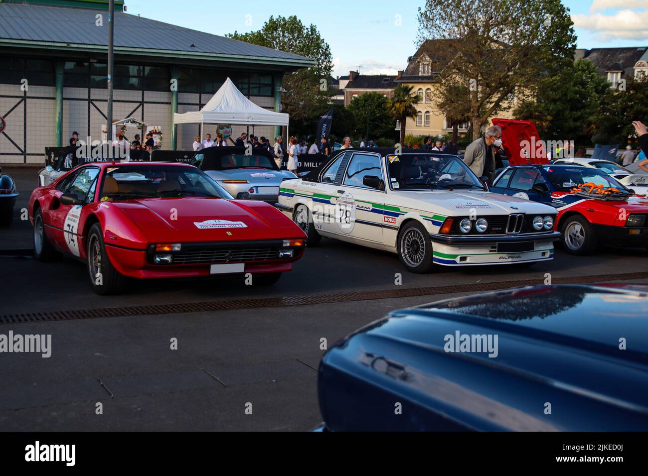 The Ferrari 308 GTB and BMW 3 series cars during the Rallye des Princesses event Stock Photo