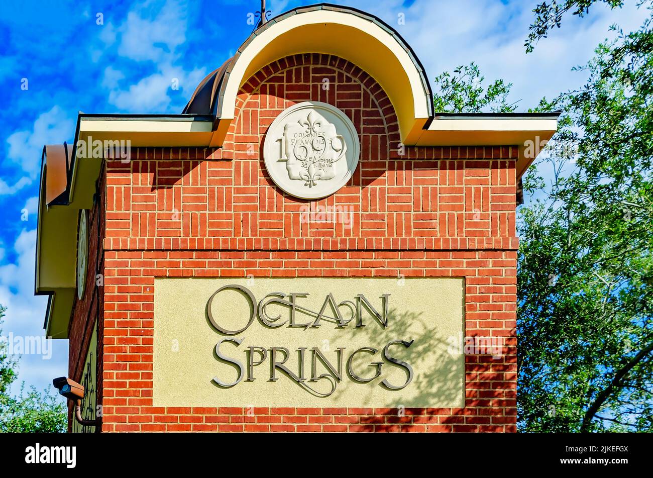 The Ocean Springs sign is pictured at the corner of Highway 90
