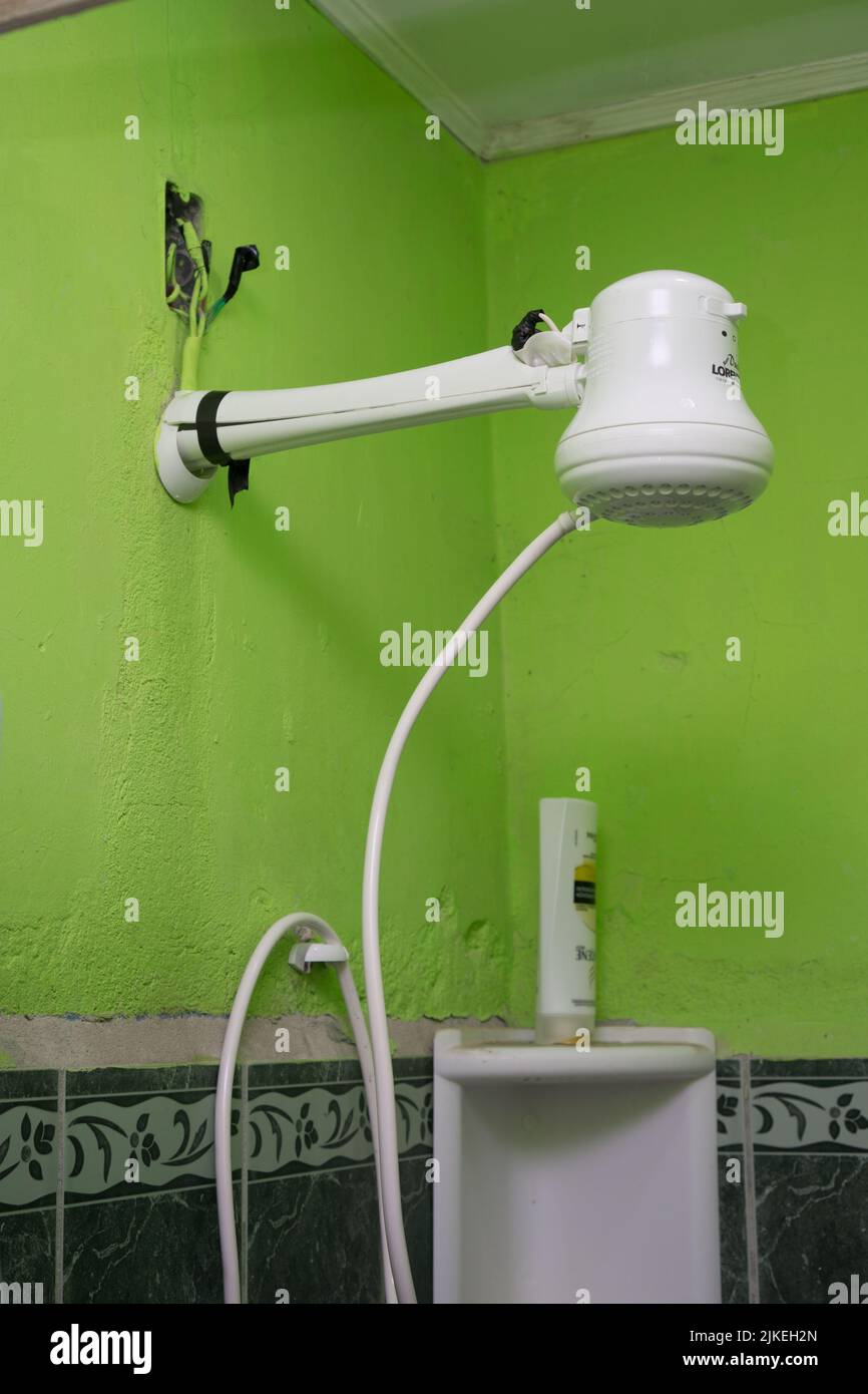 Point of use electric water heating for shower hires stock photography