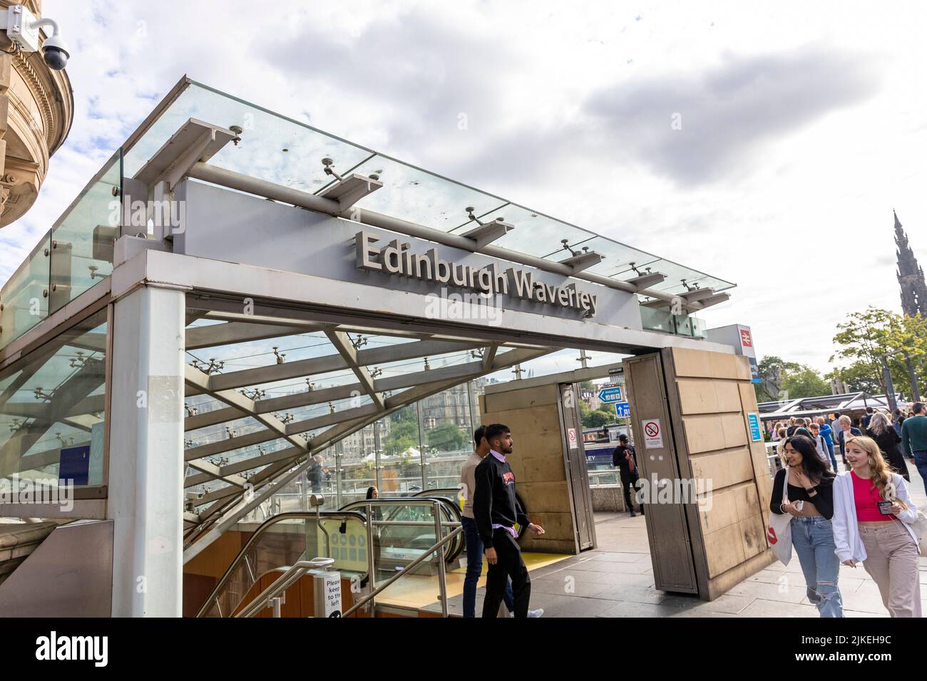 Edinburgh Waverley railway station and commuters entering on Princes