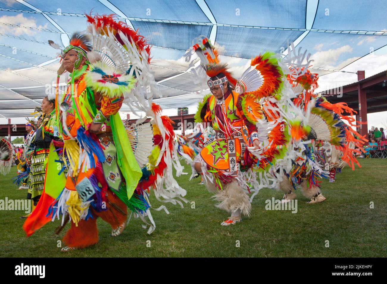 Men's traditional fancy dancers in colorful regalia at the Shoshone