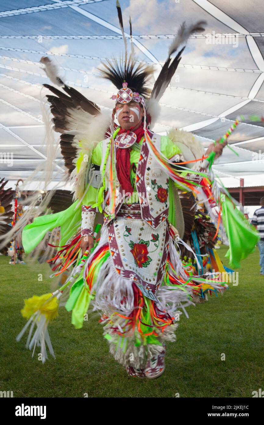 Men's traditional fancy dancer in colorful regalia at the Shoshone
