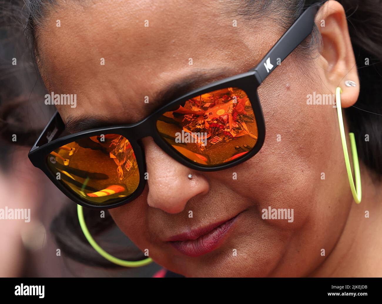 The star on the Hollywood Walk of Fame of late actor Nichelle Nichols is reflected in the sunglasses of enthusiast Leana Ahmed in Los Angeles, California, U.S., August 1, 2022. REUTERS/Mario Anzuoni Stock Photo