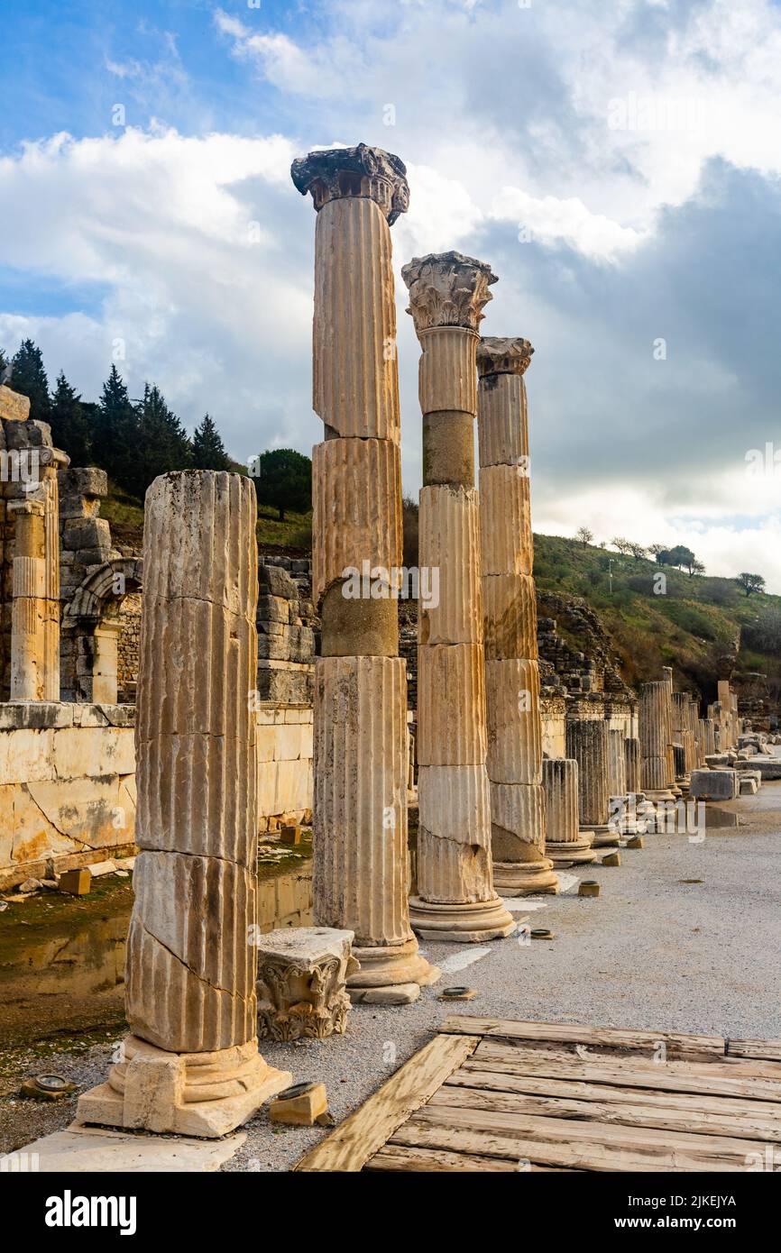 State Agora columns in ancient Ephesus with Odeon ruins in background ...