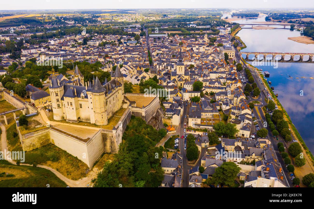 Fly over picturesque town of Saumur and medieval castle Saumur. France ...