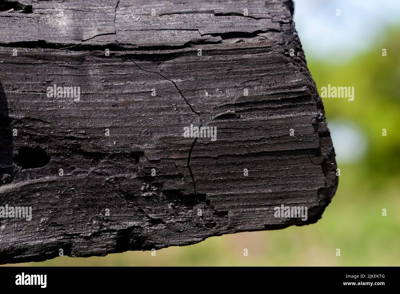 Coals for use during barbecue, black coals for maintaining heat during